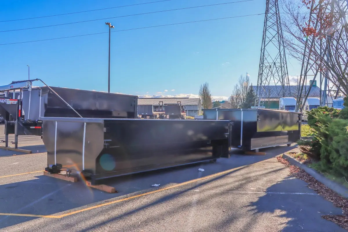 Roll-off dumpster ready for waste disposal at job site for Concrete Dumpster Rental in Dry Run
